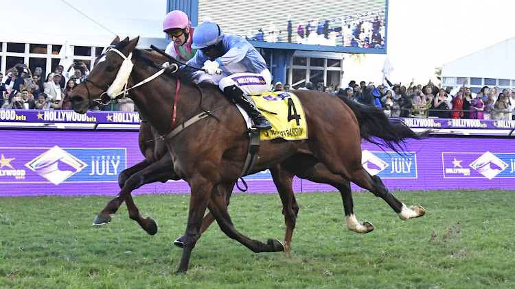 Kabelo Matsunyane and Winchester Mansion on the way to winning the 2023 Durban July. Picture: SYDNEY SESHIBEDI/GALLO IMAGES