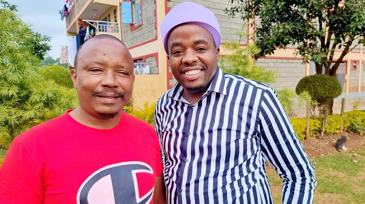 Dennis Mutara with singer Karangu