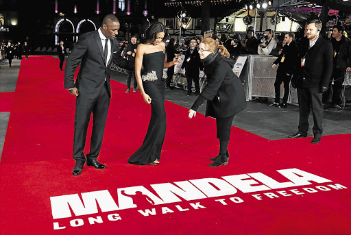 STAR STRUCK: Idris Elba, left, and Naomie Harris at last week's London premiere