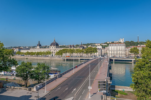 Bridge over river, cityscape and hills in this luxury property for sale in Lyon 3ème ($729,961 - 95 m²)