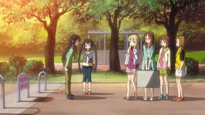 The parking spot where the girls stood in the anime