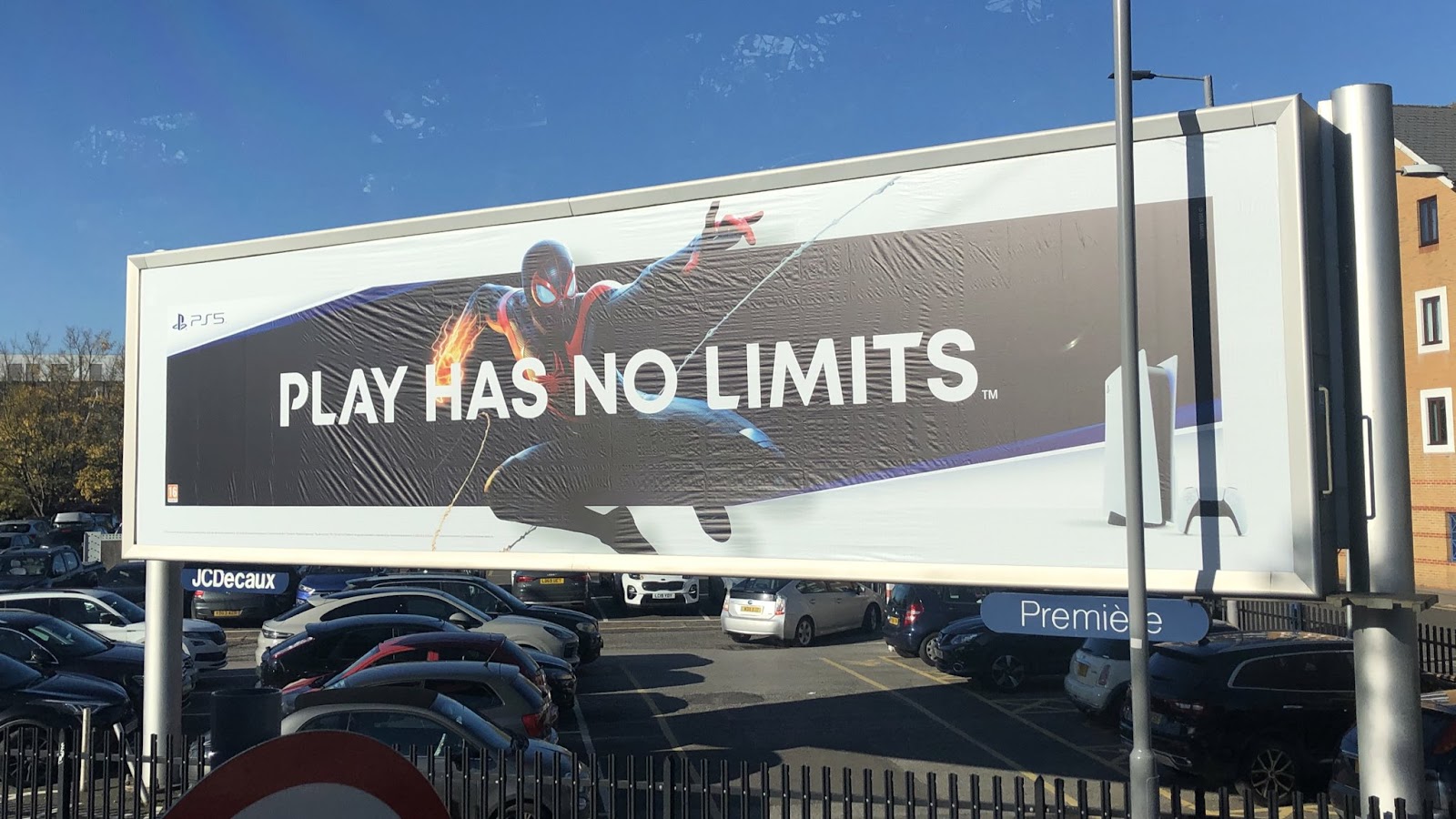 PS5's billboard with the tagline "Play has no limits"