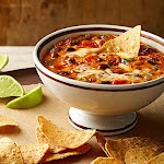 Chipotle, Chorizo, and Bean Dip was pinched from <a href="http://www.bhg.com/recipe/chipotle-chorizo-and-bean-dip/" target="_blank">www.bhg.com.</a>