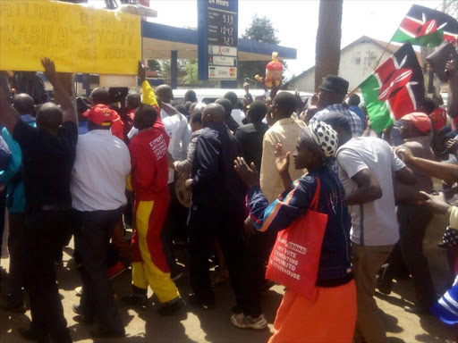 Jubilee supporters celebrate after the Supreme Court upheld President Uhuru Kenyatta's election, November 19, 2017. /WAMBUGU KANYI