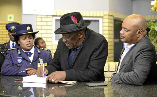 North West commissioner Baile Motswenyane, minister of police Bheki Cele and MEC for community safety and transport management Mpho Motlhabane during the official opening of Mareetsane police station. /Tiro Ramatlhatse