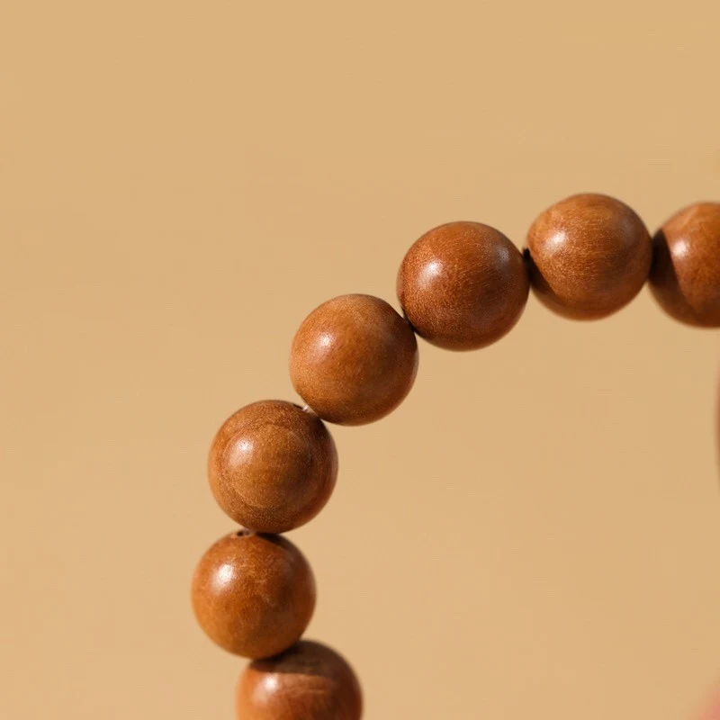 Bracelet Femme en Bois de Pêche Artisanat Cercle Unique Élégance Naturelle Bijou Fait Main Accessoire Tendance.