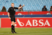 Premier Soccer League (PSL) referee Chris Harrison taking charge during Absa Premiership match between Mamelodi Sundowns and Polokwane City at Loftus Versveld Stadium, Pretoria South Africa on August 22 2017. 
