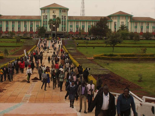 Moi University staff leave the main administration block at the campus in Kesses, Uasin Gishu county, June 6, 2018. /MATHEWS NDANYI