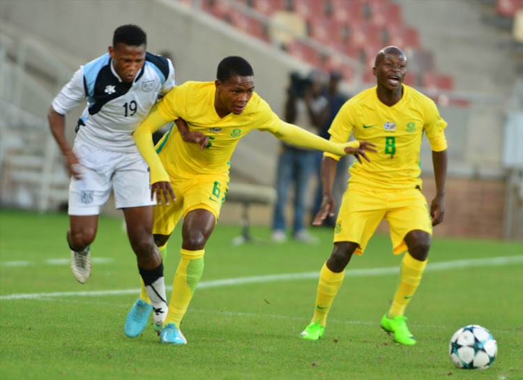 Wiseman Meyiwa of South Africa and Lesenya Ramoraka of Botswana during the COSAFA Cup 2018 Plate Final match between South Africa and Botswana at Peter Mokaba Stadium on June 08, 2018 in Polokwane, South Africa.