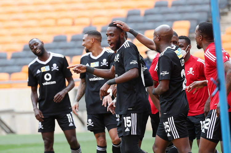 Fortune Makaringe celebrates with teammates after scoring the opening goal of a match.