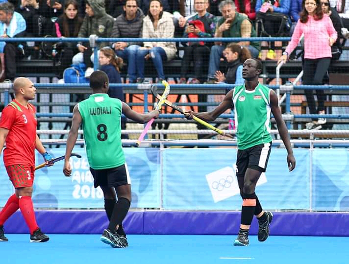 Ian Olando celebrates with Ivan Ludiali in the Youth Olympic Games in Buenos, Argentina.