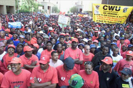 HEAR US ROAR: Cosatu marchers in Johannesburg. 11/05/07. Flexing muscle: Cosatu members march in Johannesburg during the two day strike to protest against the government's privatisation policy. Pic: Elizabeth Sejake. © ST.