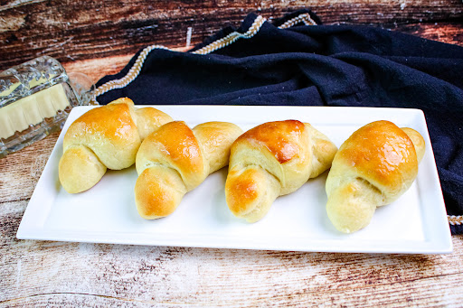 A platter of Purple Ribbon Winning Crescent Rolls.
