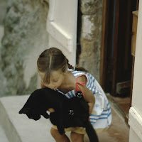 la bimba e il gatto di 