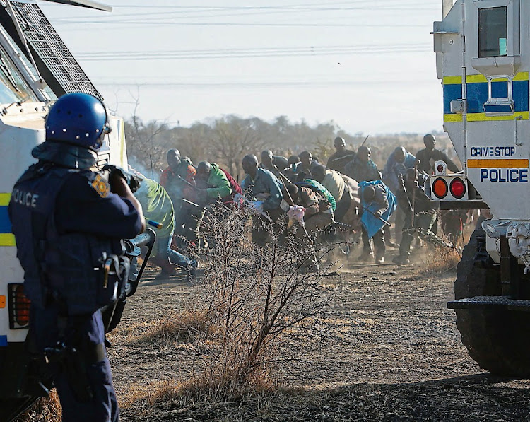 Police fire on mineworkers in Marikana in the North West on August 16 2012. The massacre left 34 men dead.