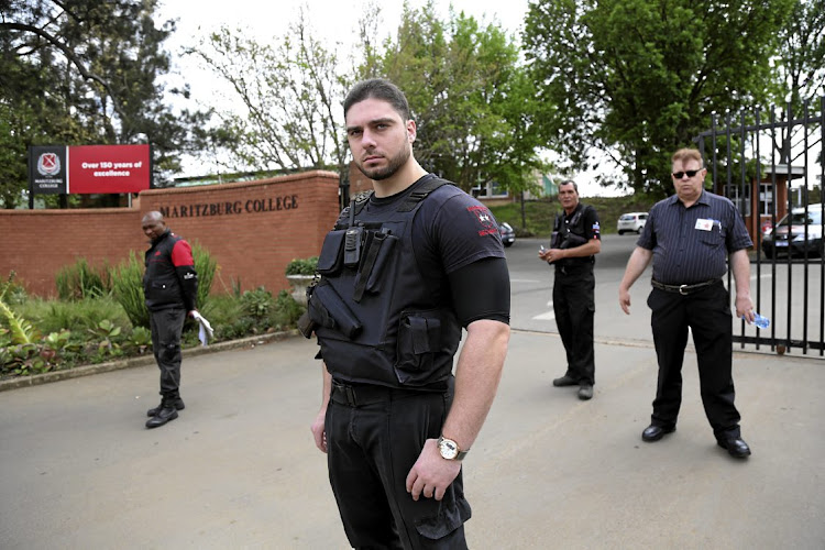 Security guards patrolled the entrance to the elite Maritzburg College on Monday.