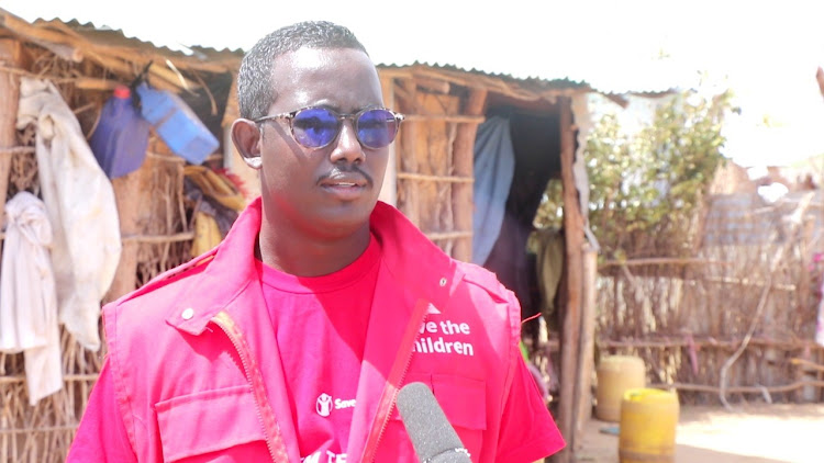 Sugow Mathey, a nutrition coordinator at the Save the Children speaks to the press on Sunday, October 9, 2022.