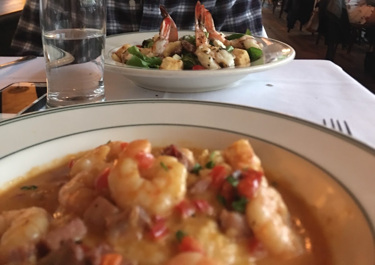 Shrimp and grits in the front.