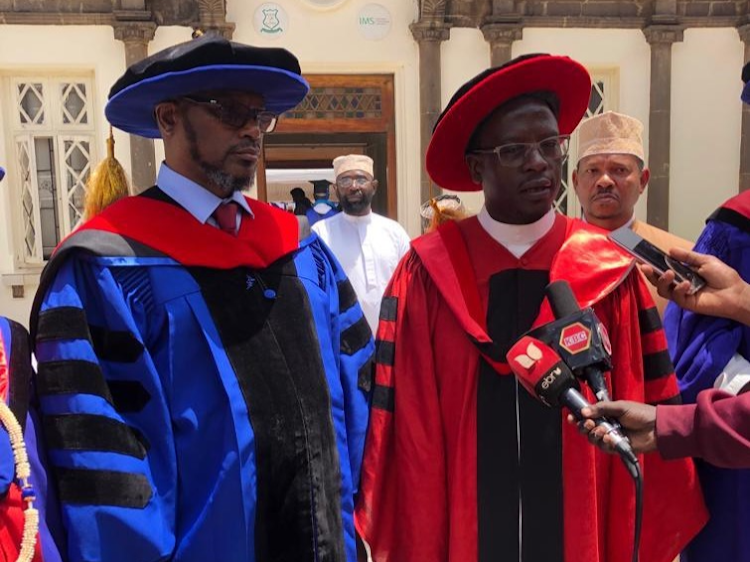SUPKEM) National Chairman Al-Hajj Hassan ole Naado(right) with Vice Chancellor of the Islam Open University Dr Cherno Omar Barry(left) during the 8th graduation ceremony held at the Muslim Academy, Nairobi.