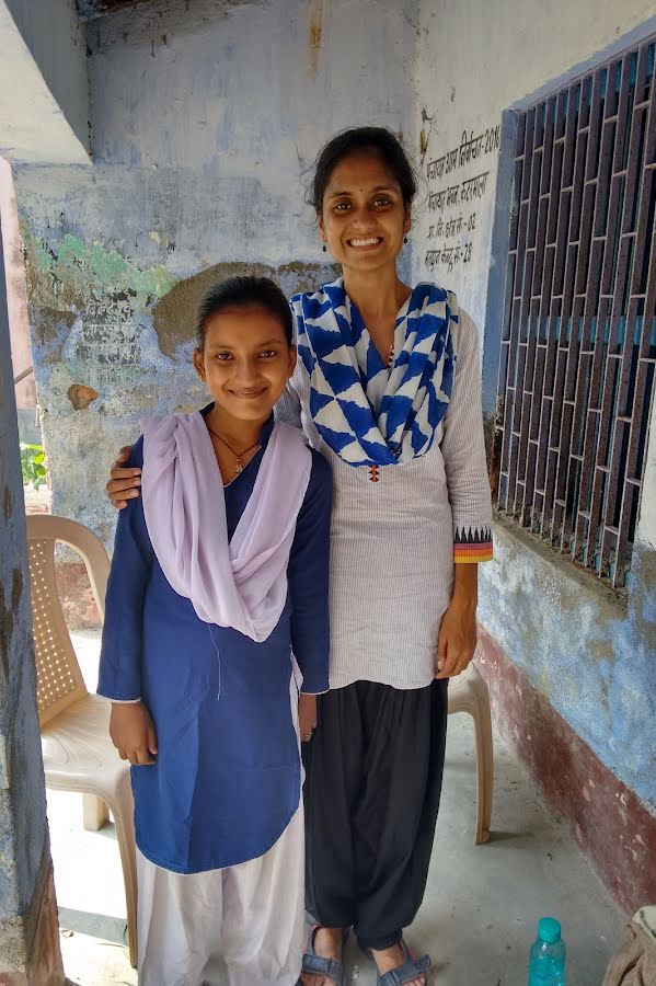 Two girls standing