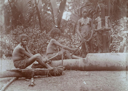 Papuan women pounding sago