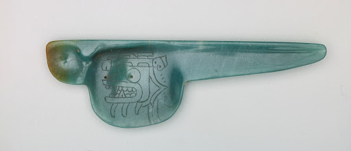 Pendant: spoon with incised motif in bowl