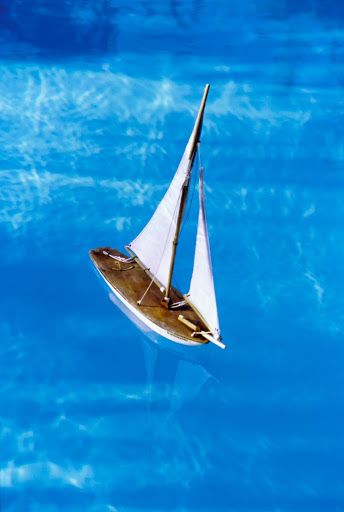 Toy Boat in the Pool at the Home of India Hicks and David Flint Wood, Vogue