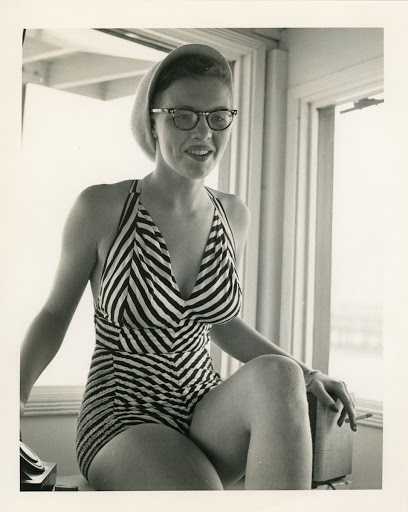 Woman in Striped Swimsuit