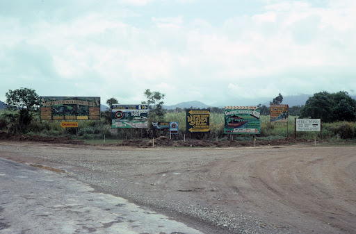 Billboards on southern side of Daintree River, Daintree