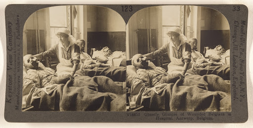 Ghastly Glimpse of Wounded Belgians in Hospital, Antwerp, Belgium. (Verso)
