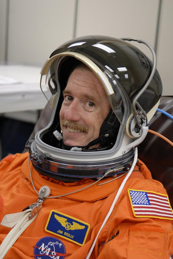 Mission STS-117 Mission Specialist James Reilly has donned his launch suit and helmet for a fit check.