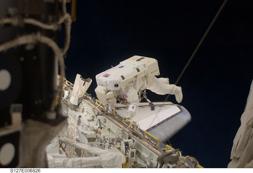 Kopra in Endeavours Payload Cargo Bay during EVA-1 on STS-127 / Expedition 20 Joint Operations