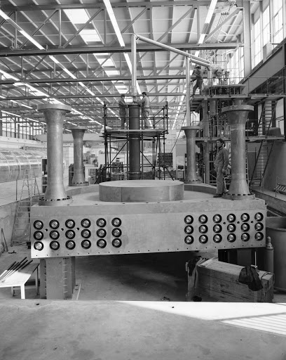 Omega spectrometer installation at the West Experimental Hall