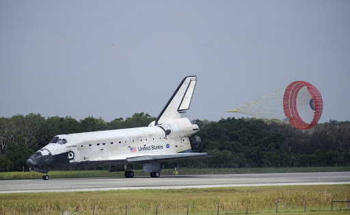 Discovery comes to a stop on Runway15 with the aid of a drag chute to end the STS-124 mission a flight to the International Space Station.