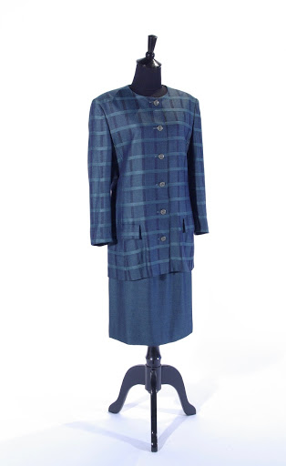 Green wool suit with demi-fitted jacket over skirt