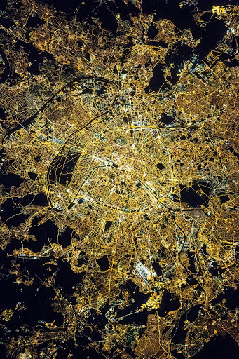 Paris, the 'City of Light', at night (NASA CC BY-NC 2.0).