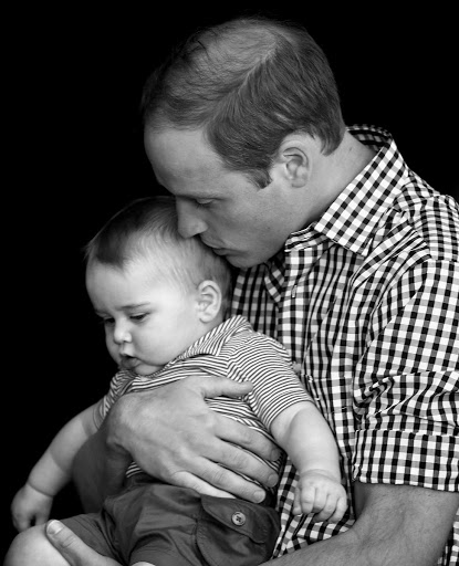 The Duke of Cambridge kisses Prince George of Cambridge