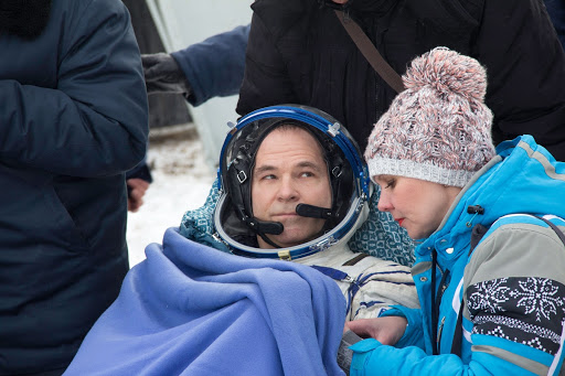 Kevin Ford rests in a reclining chair after he landed in their northeast of Arkalyk Kazakhstan.