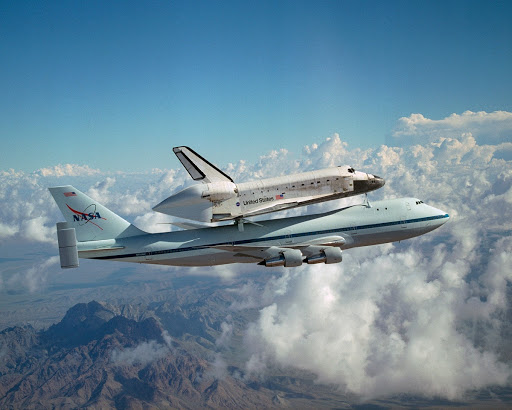 The Space Shuttle Discovery hitched a ride on a special 747 carrier aircraft for the flight from California to the Kennedy Space Center, FL, on August 19, 2005
