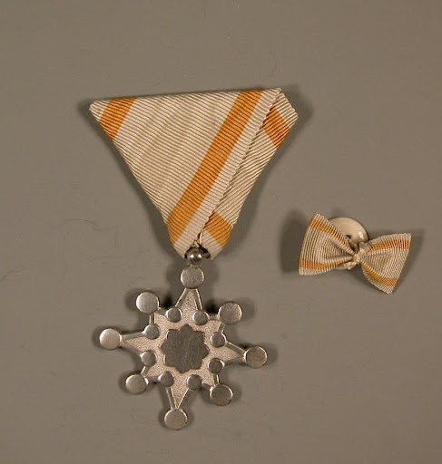 Medal and button
