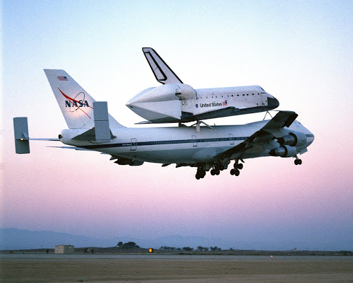 The Space Shuttle Endeavour, mounted securely atop one of NASA's modified Boeing 747 Shuttle Carrier Aircraft, left NASA's Dryden Flight Research Center at Edwards Air Force Base in Southern California at sunrise on Friday, June 28, nine days after conclu