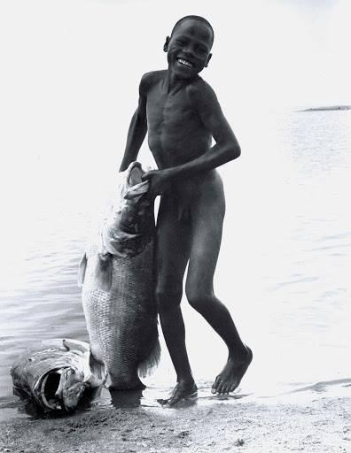 An El-Molo boy with his Nile perch catch