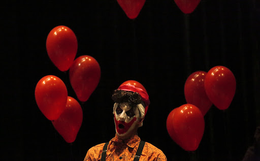 With a lot of color, the costumes and scenery create the Circus atmosphere in "I Pagliacci."
