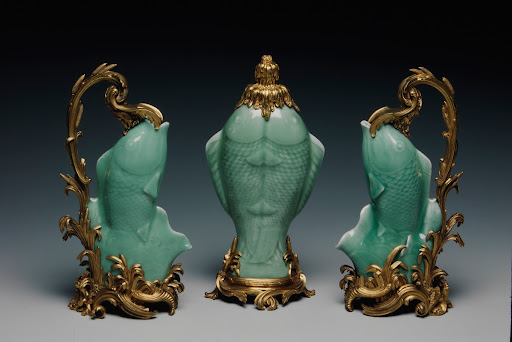 Three fish-shaped vases
