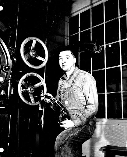 Rollo G Miller, recipient of $5,000 suggestion award highest award ever granted by General Electric Company under its suggestion award system.