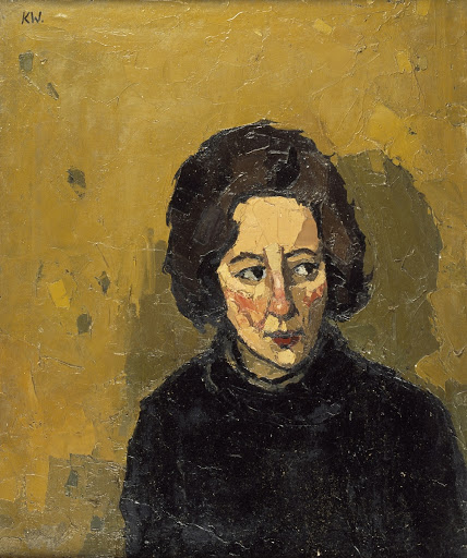 Portrait of a young woman looking left