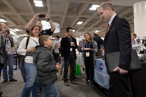 ACD15-0224-096. John M. Grunsfeld talks to the attendees of the The AGU meet at the Moscone Center in San Francisco.