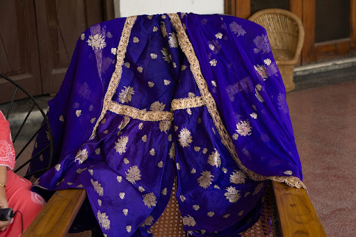 A blue Banarsi silk (poth) gharara set