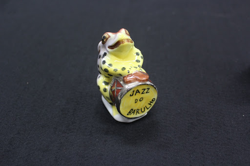 Colorful frog in crockery