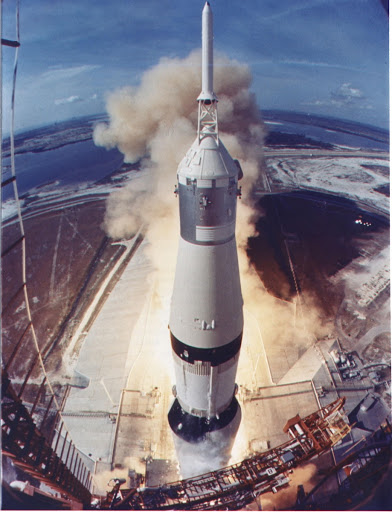 The Apollo 11 Saturn V space vehicle lifts off with Neil A. Armstrong Michael Collins and Edwin E. Aldrin Jr. from Kennedy Space Center's Launch Complex 39A.